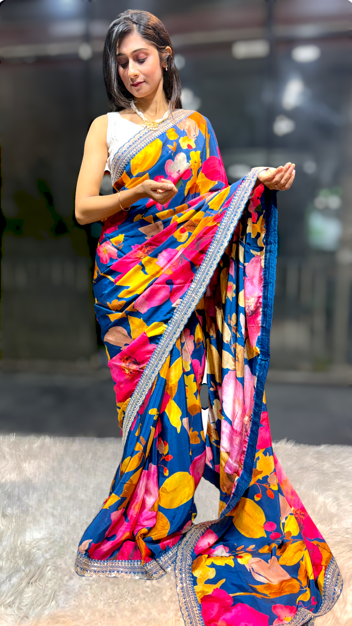 Turquoise Floral Designer Saree with Embellished Border