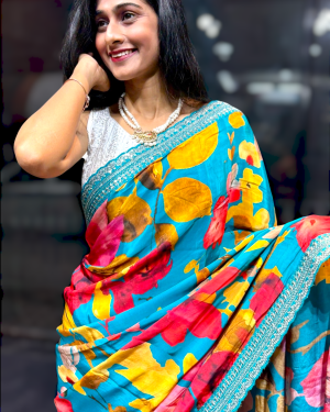 Turquoise Floral Designer Saree with Embellished Border
