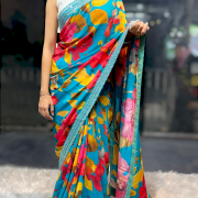 Turquoise Floral Designer Saree with Embellished Border